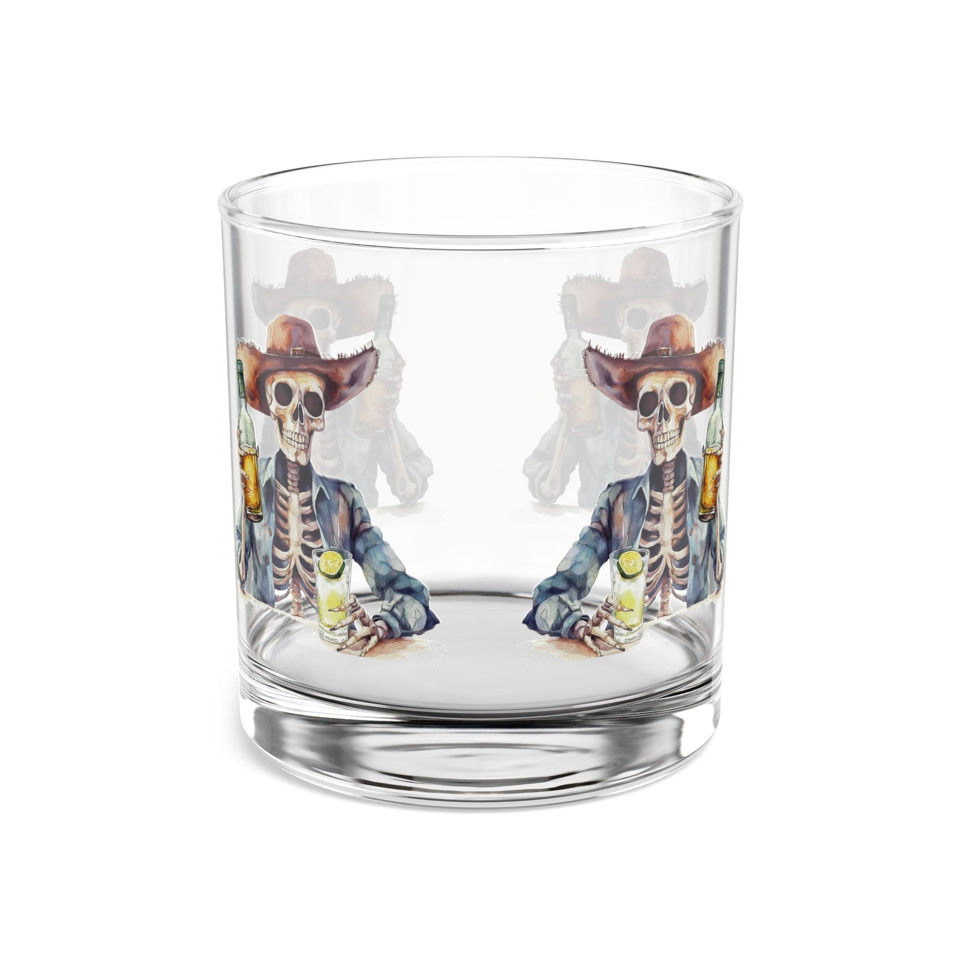 Clear glass tumbler with skeleton cowboy design