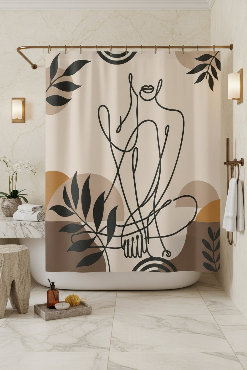Beige abstract figure shower curtain hanging from a gold-colored rod in a white marble bathroom.