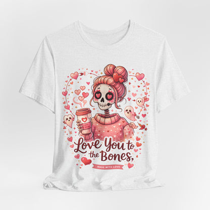 Valentine’s Day graphic featuring a kawaii skull girl in pink with heart eyes, coffee vibes, and small cupid ghosts around the lettering.