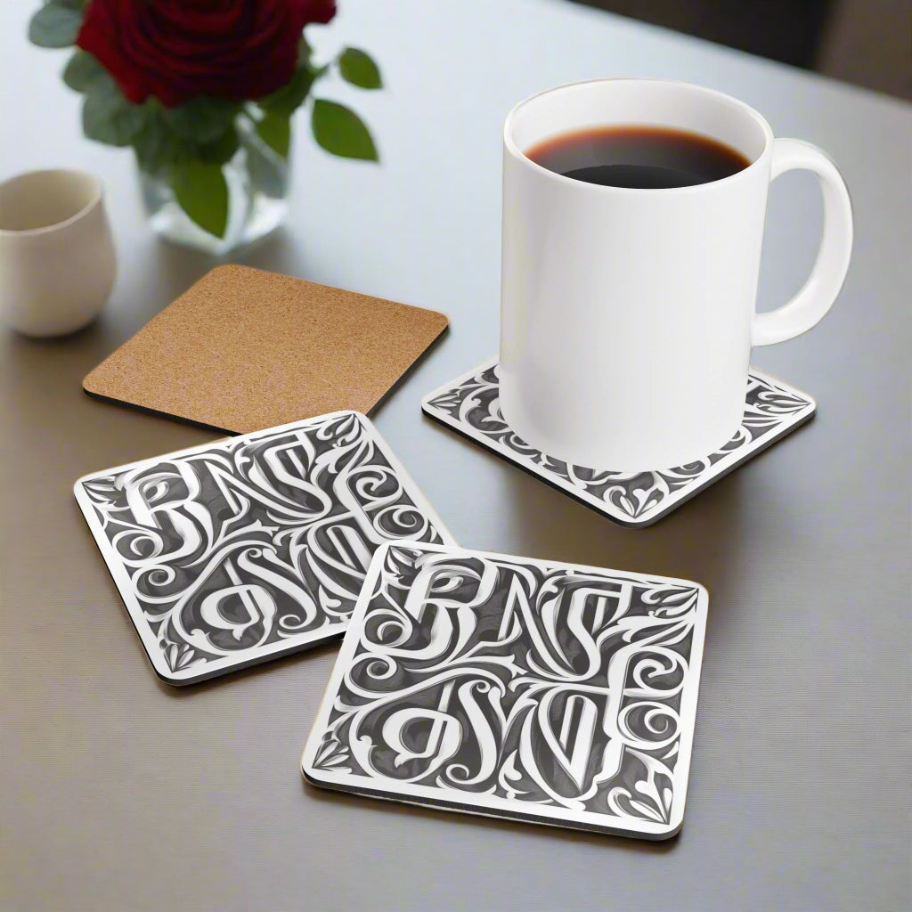 A set of four decorative drink coasters with intricate floral designs, displayed alongside a cup of coffee; one coaster is placed under the cup demonstrating its use.
