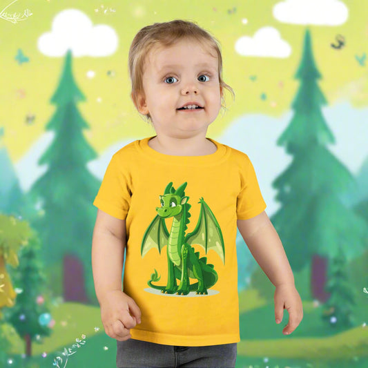 Child wearing a yellow t-shirt with a dragon graphic.