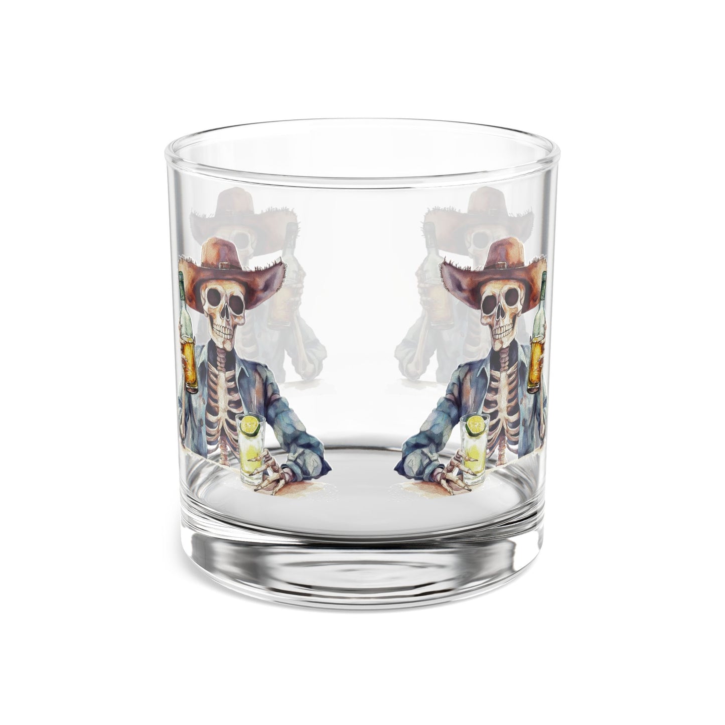 Clear glass tumbler with skeleton cowboy design