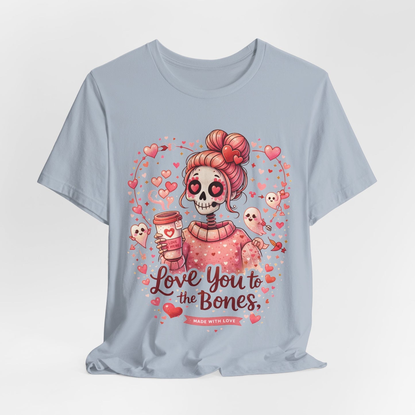 Spooky Valentine quote ‘Love you to the bones’ with a pink skull girl, heart eyes, coffee cup, and cute cupid ghosts