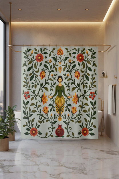 A fabric shower curtain featuring a vintage botanical illustration with a central female figure, surrounded by red flowers, green leaves, and vines on a pale sage background. The curtain is shown hanging from silver rings on a white rod, with small silver feet visible at the bottom.