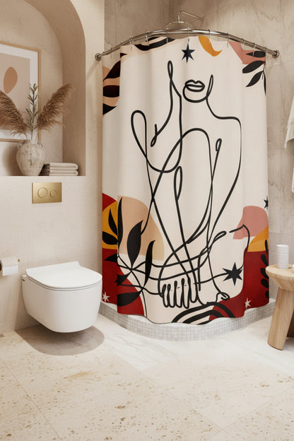 Bathroom with a shower curtain featuring abstract designs.